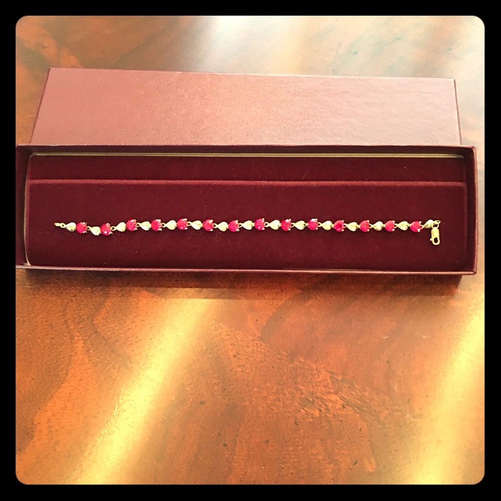 14KT Gold Bracelet with Heart Shaped Rubies